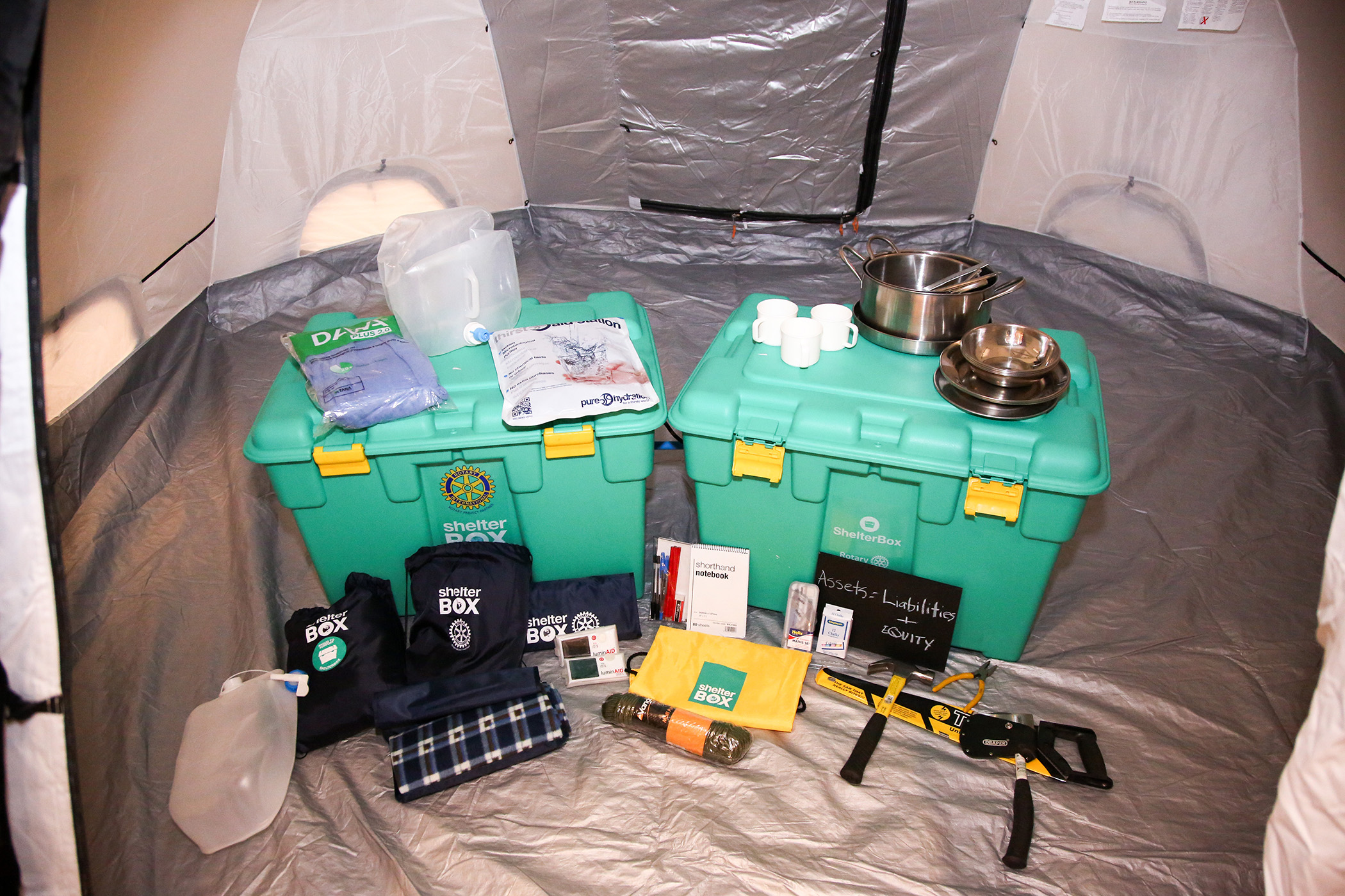 Shelter Boxes with all of the various aid items we offer