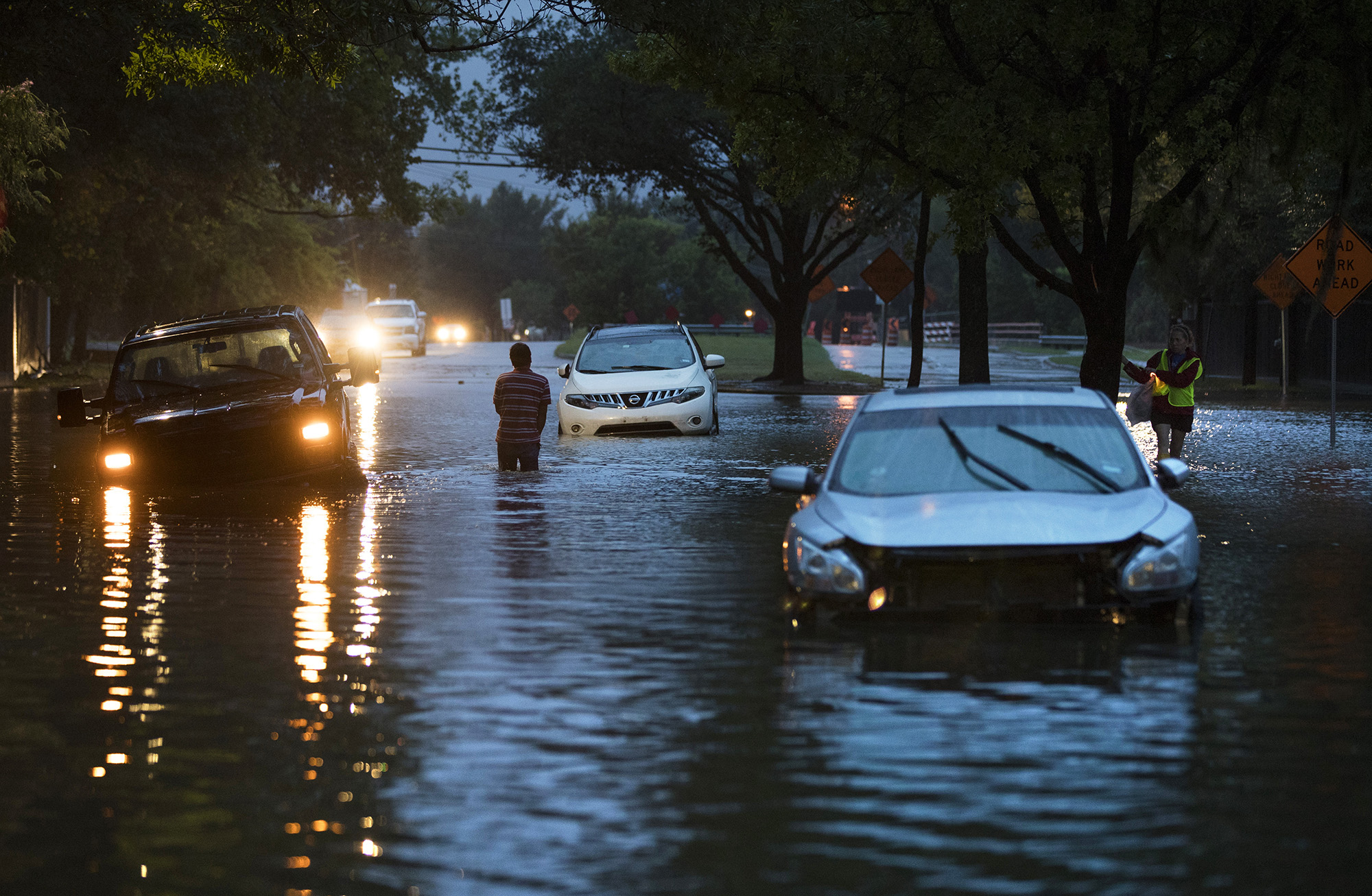 HOUSTON, TX - AUGUST 28: Stranded vehicles sit where they got stuck in high water from Hurricane Harvey on Voss Road in Houston, Texas August 28, 2017. (Photo by Erich Schlegel/Getty Images)