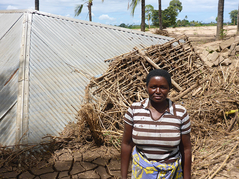 An entire structure buried by flood waters and mud