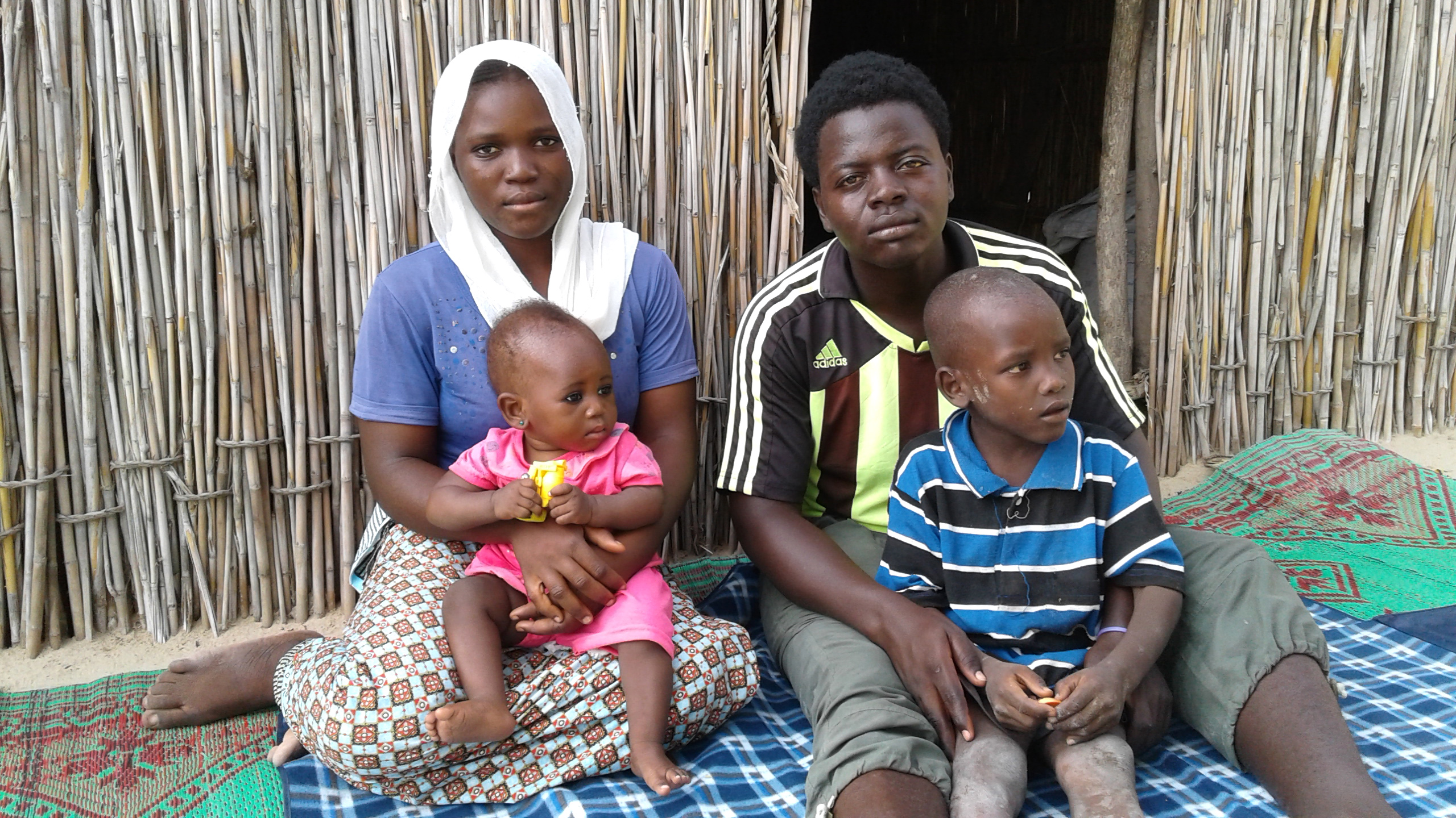 Abdou with his wife and 2 children