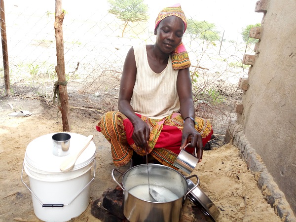 SB_Chad_Harmata_CaseStudy_2018_02 600 px Harmata cooking with new kitchen set