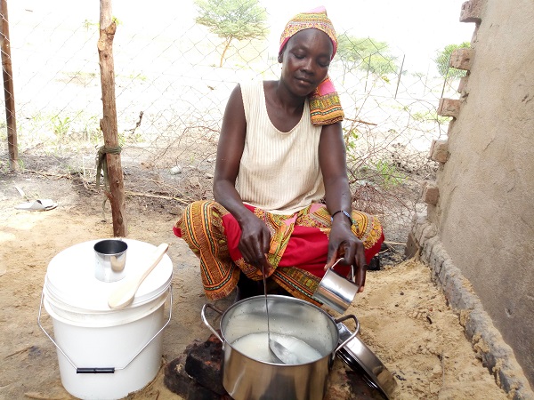 Harmata cooking with new kitchen set