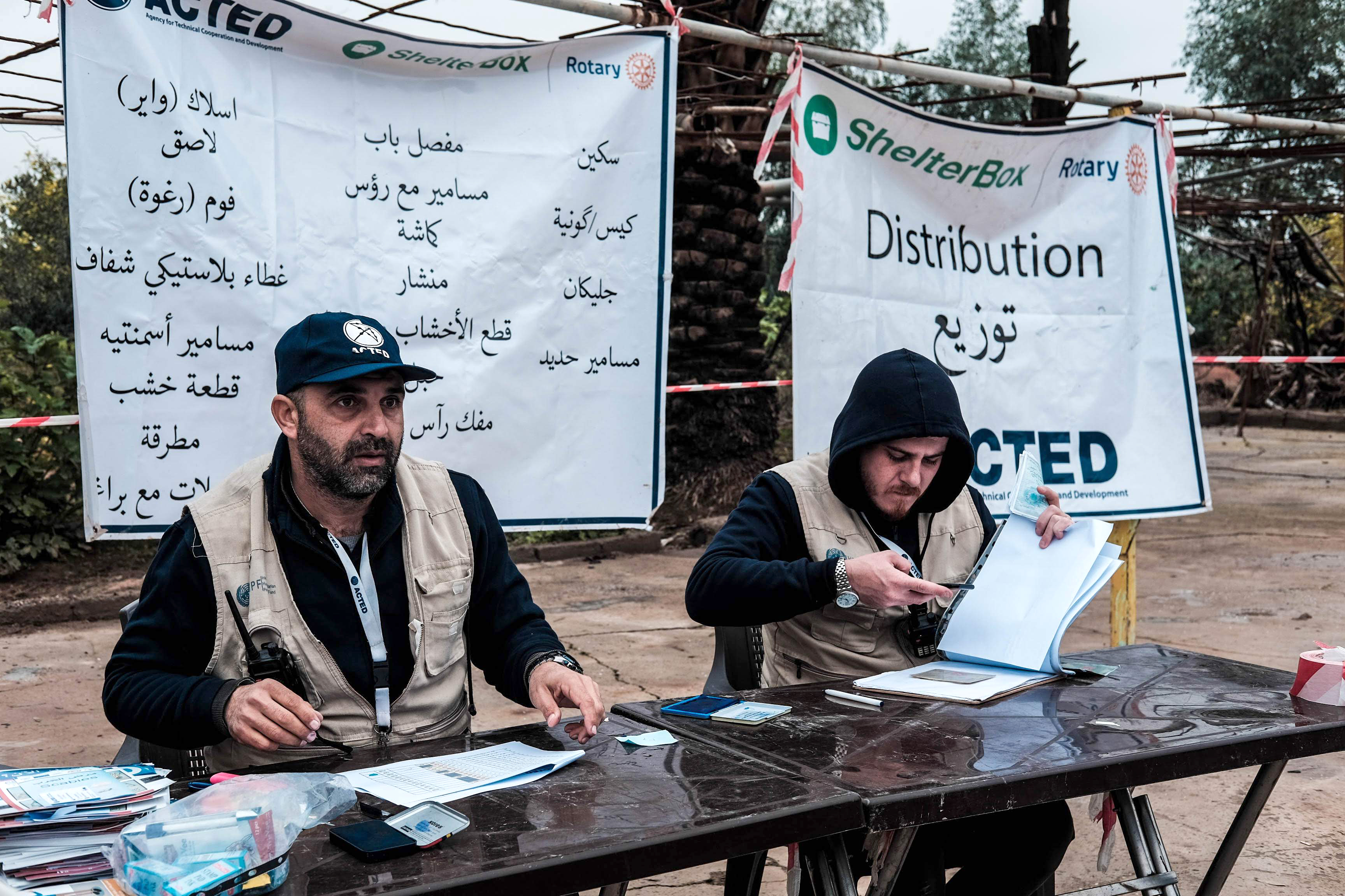 Acted workers at their information table