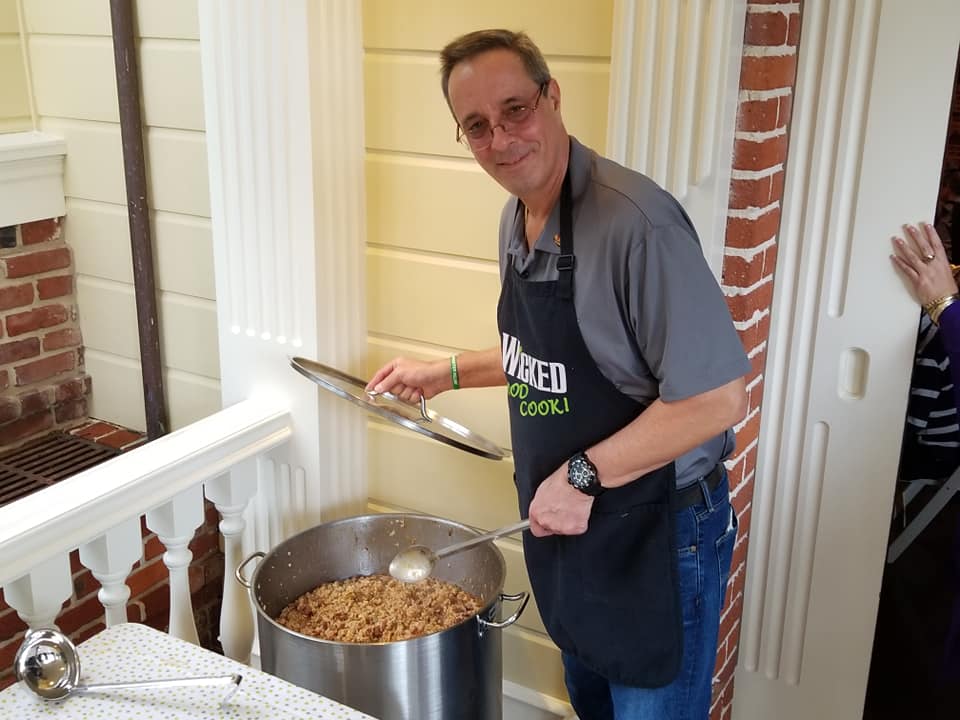 Jim in his apron, cooking