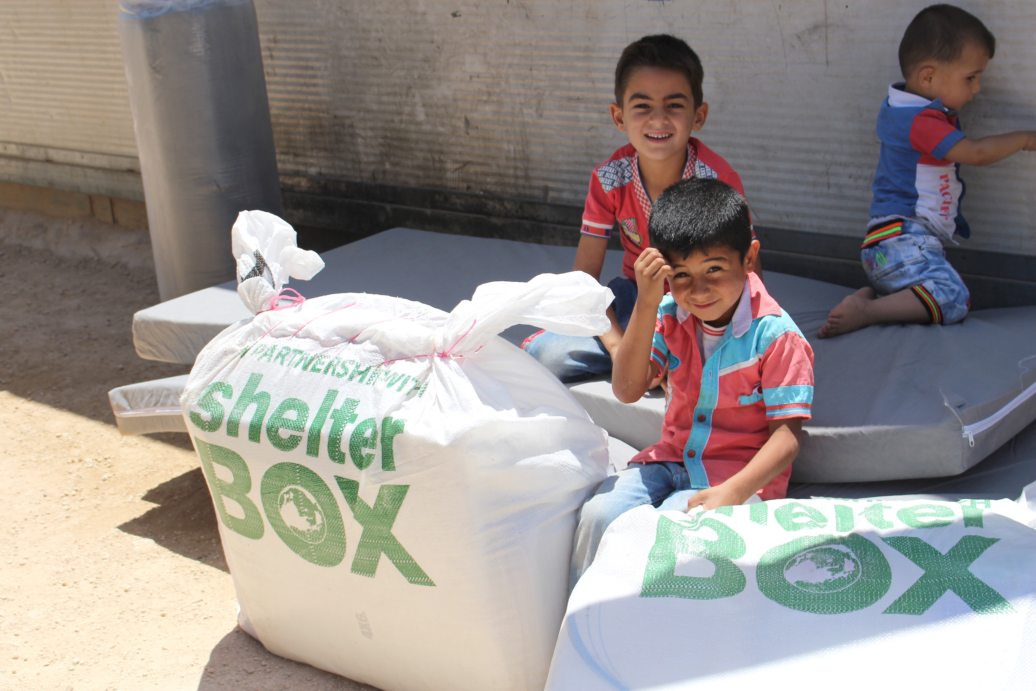 Local children keep cool in the shade