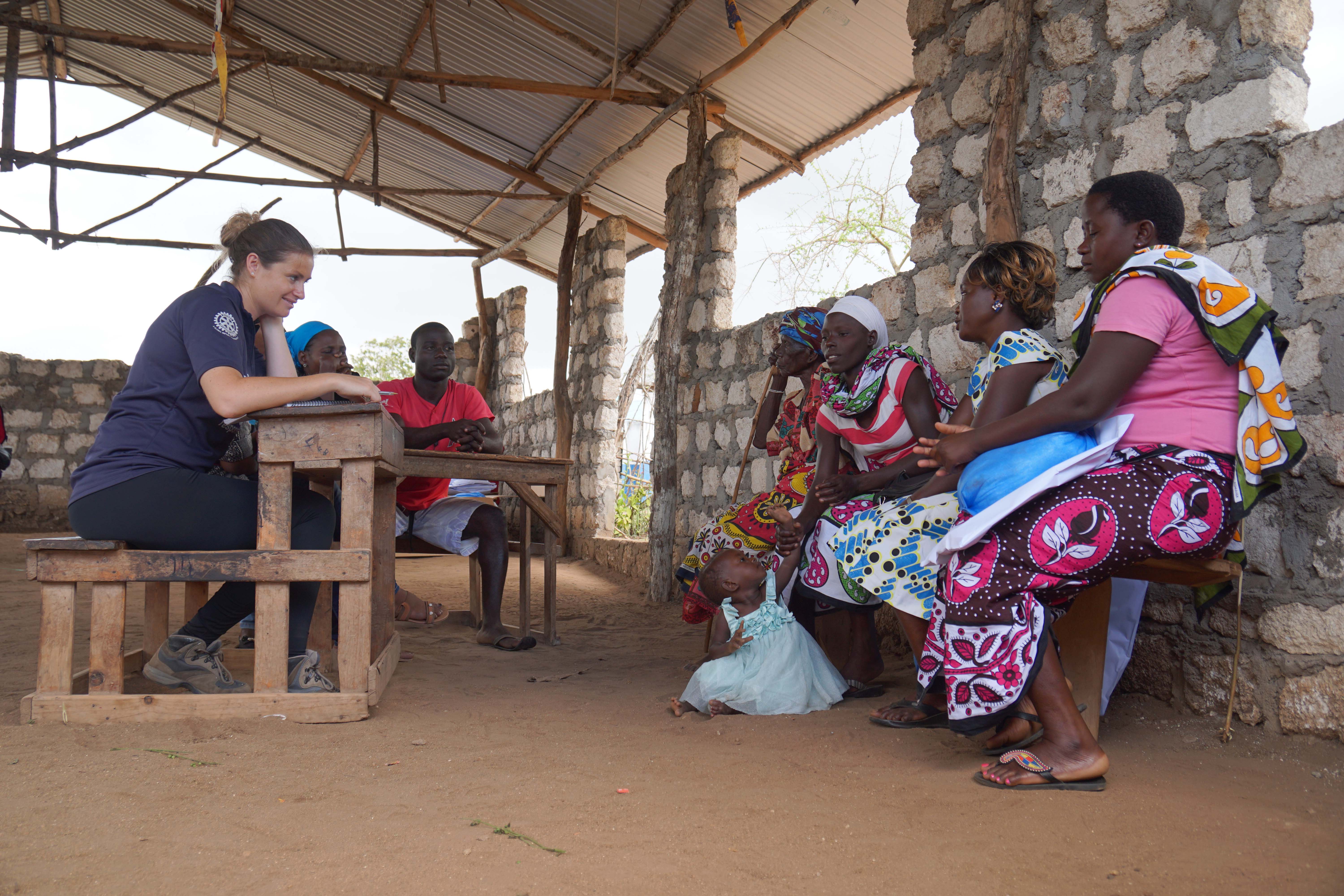 SRT member giving an instructional training on how to build with Shelter Kits