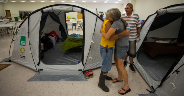 Hugging after Hurricane Harvey