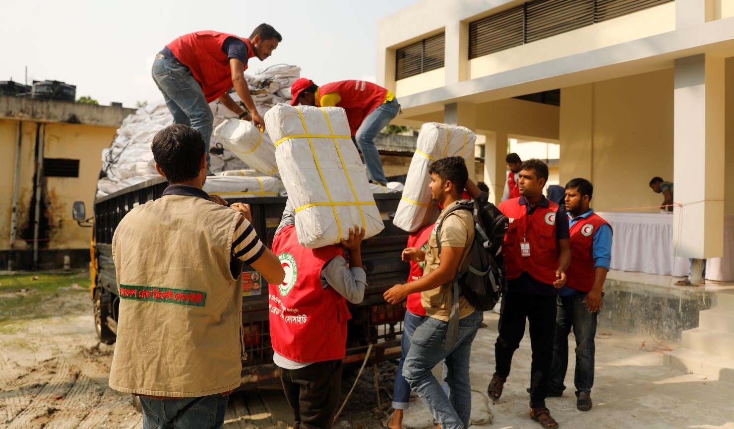 BDRCS Team members unloading a truck