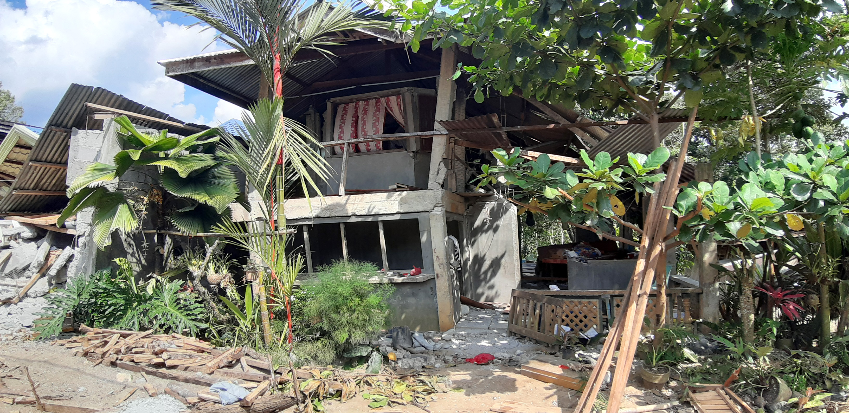 A home swayed by the winds that still stands
