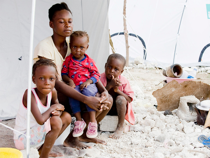 Family in their ShelterBox tent