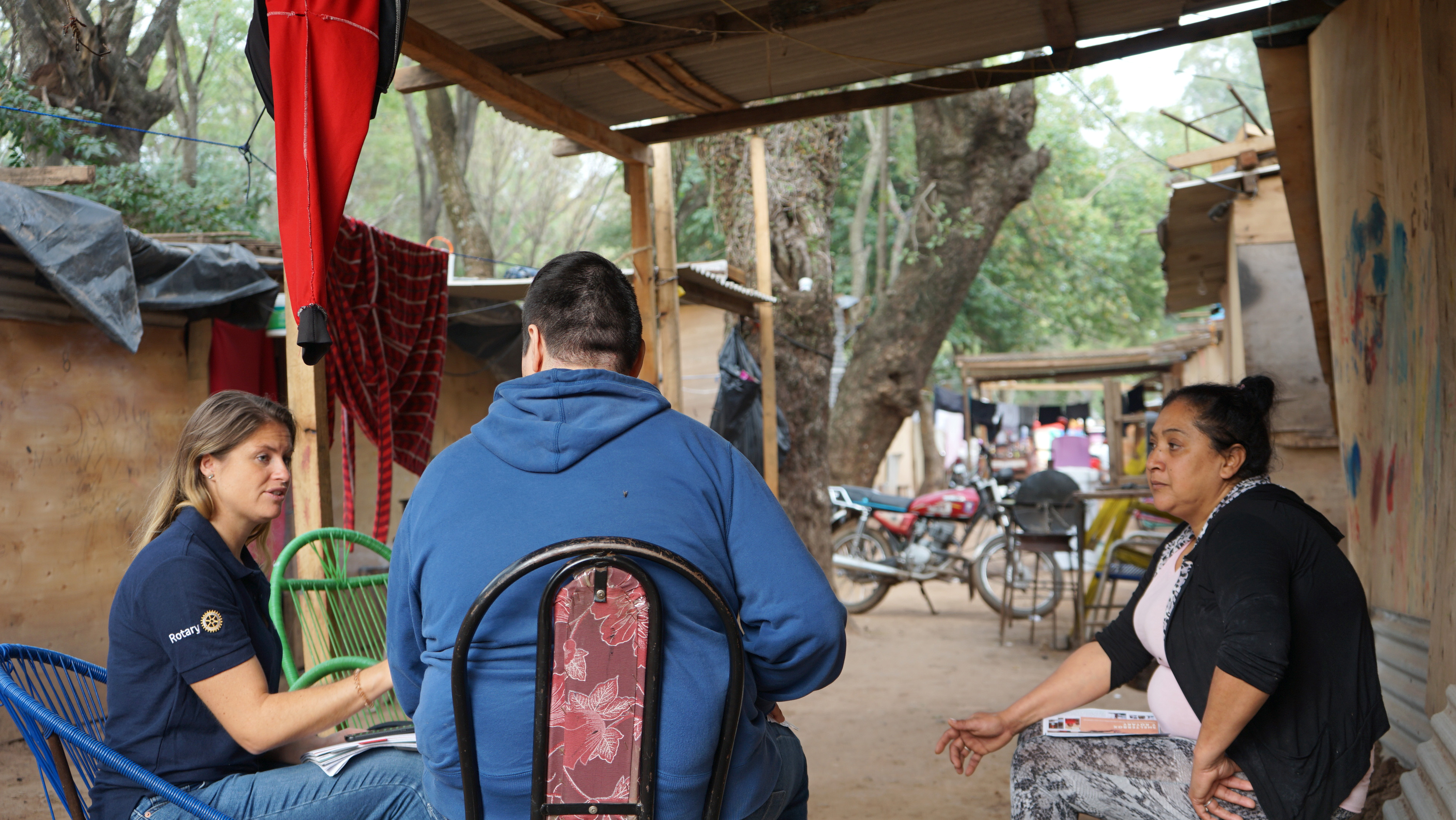 Lillian conversing with aid workers