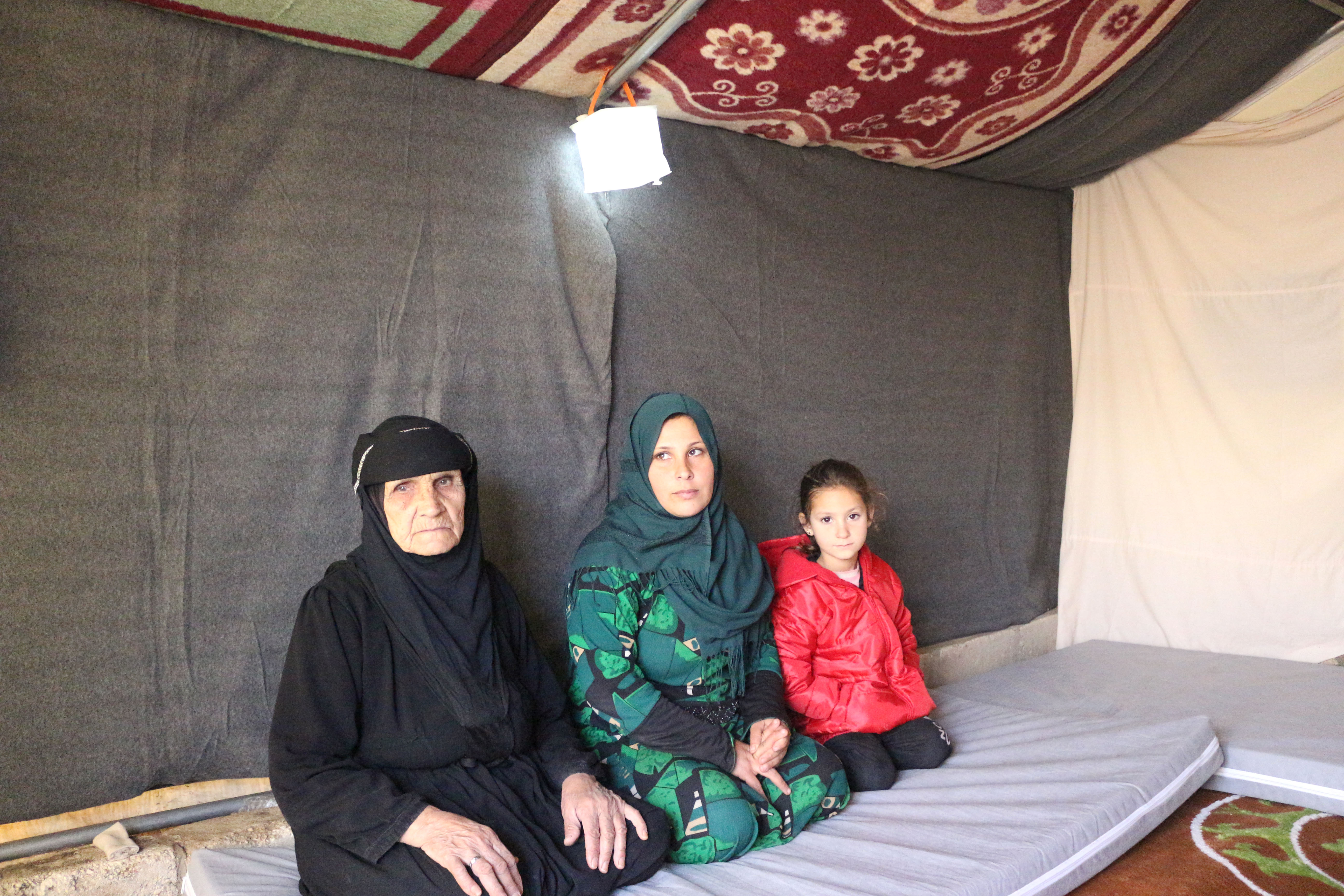 Samira, Fatima, and her grandmother