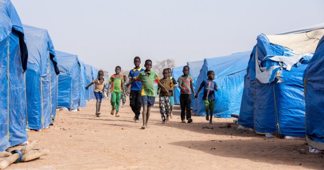 Kids running through a camp - Burkina Faso Conlfict