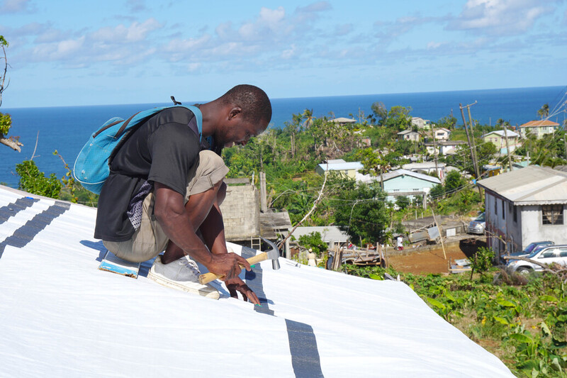 Repairing the roof in Dominica after Hurricane Maria