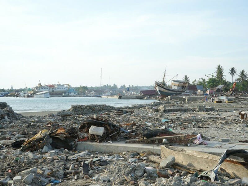 Boats and other debris washed up on the beach, Indonesia