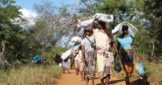 People affected by Cyclone Dineo with ShelterBox aid items