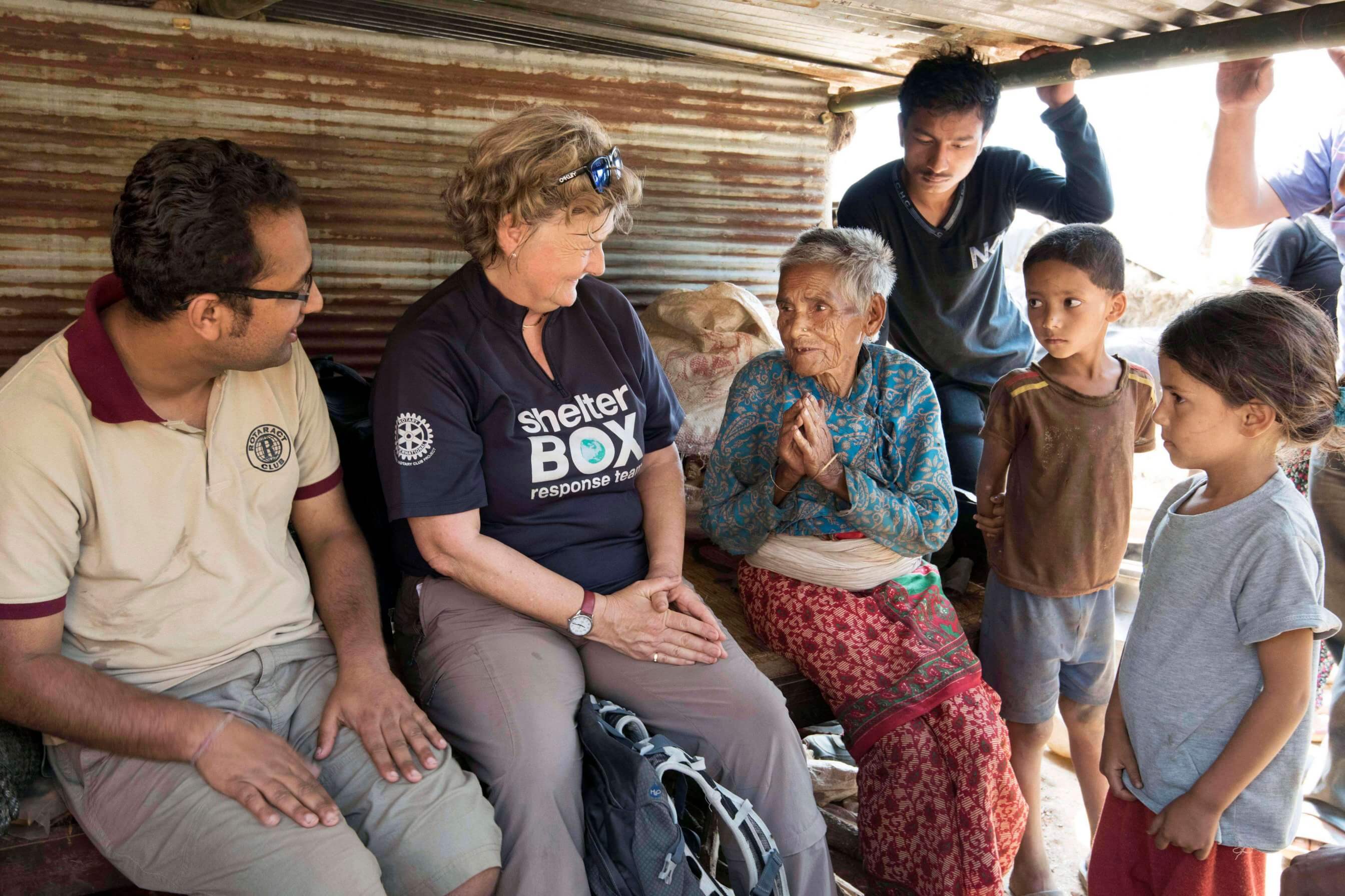 A ShelterBox Response Team member meets with families we supported in Nepal after the earthquake in 2015