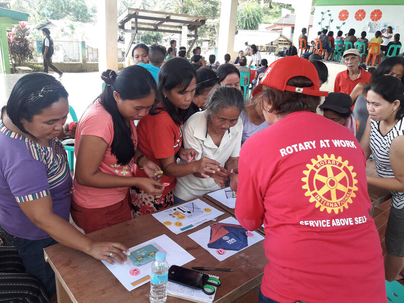 Rotary Team member assisting Filipinos after the tropical storm in 2019