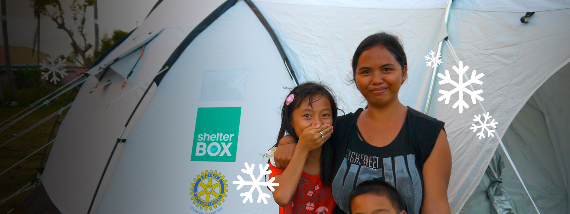 Mother and Children outside tent Philippines