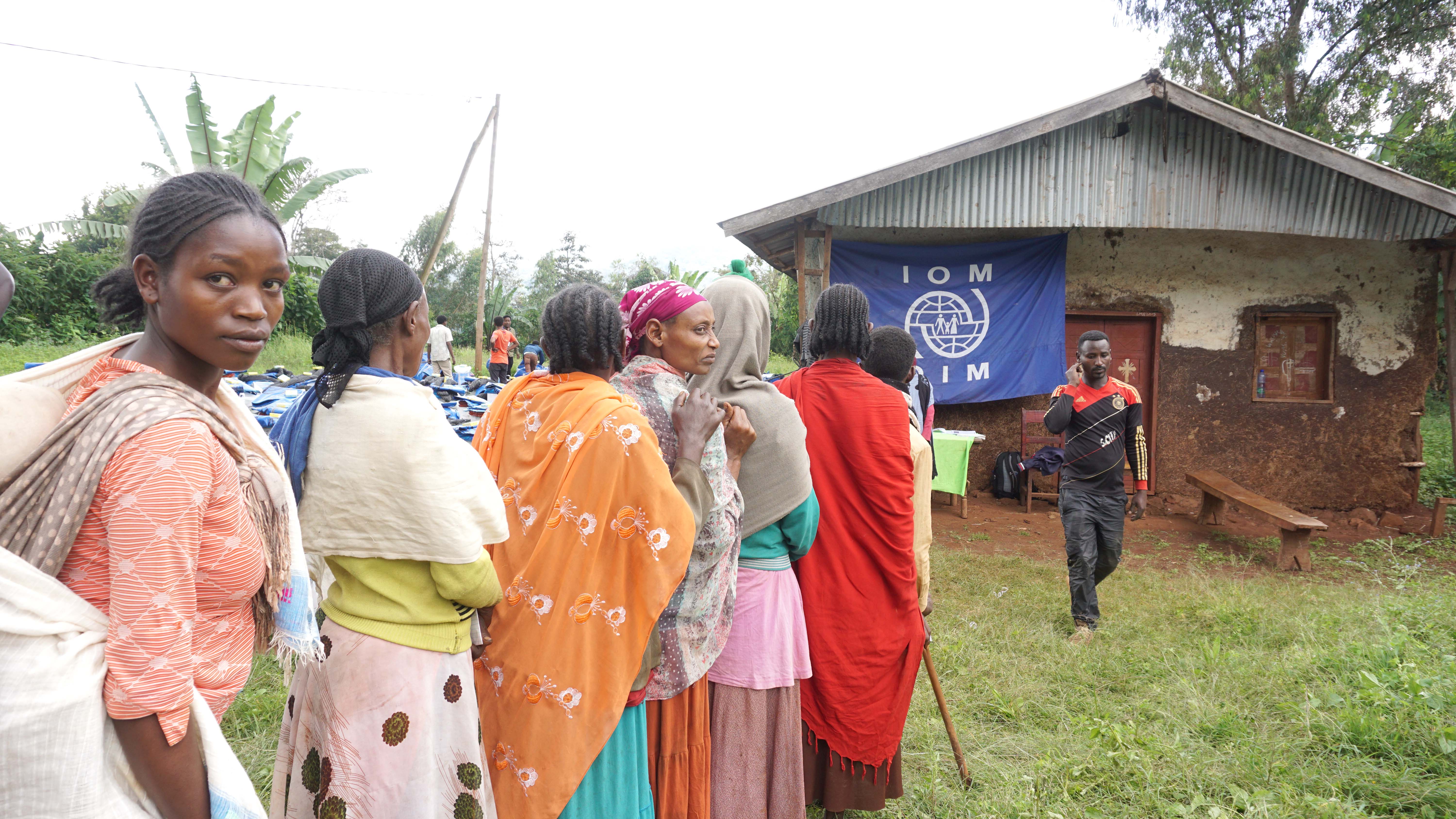 Women wait in line for help from IOM, Ethiopia
