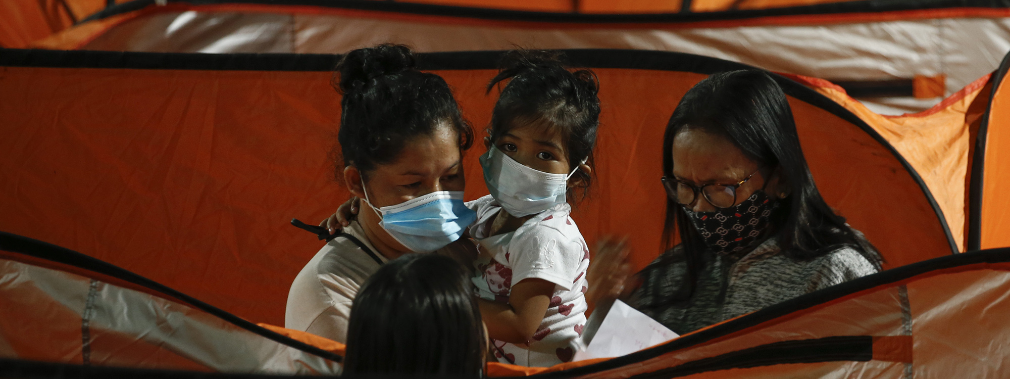 Wearing masks in the Philippines after typhoon Goni