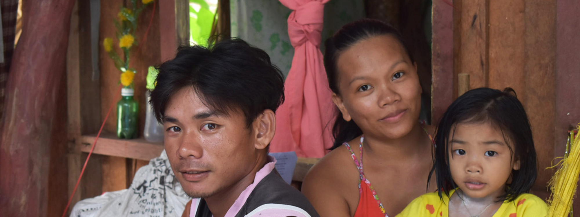 Family poses following Typhoon Vongfong