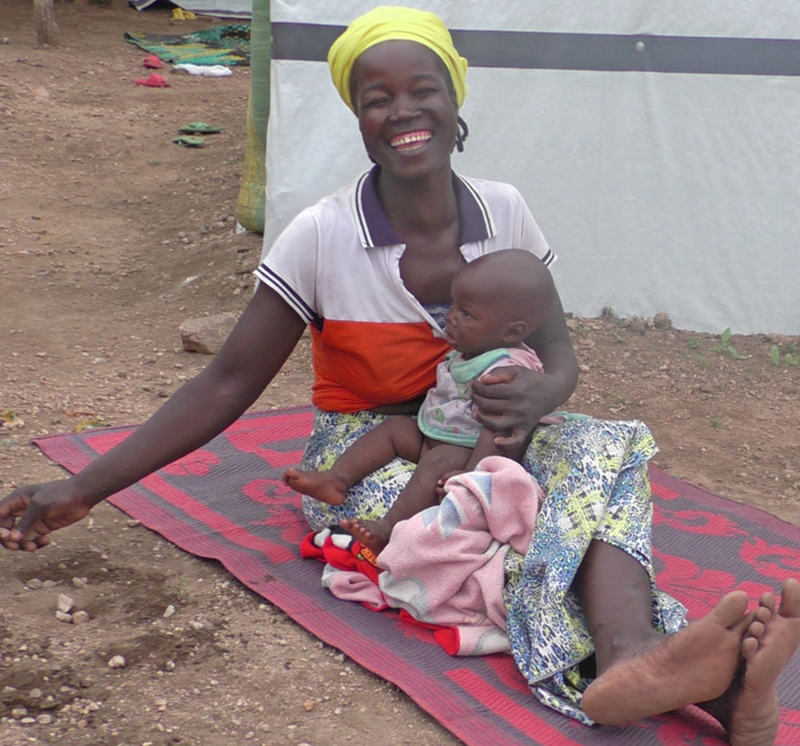 Kaltoumi holding her child